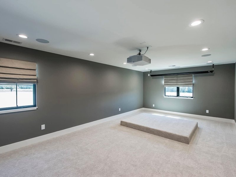 Bedroom with new carpeting from a local flooring store, contrasting big box store options, in Portland and Springfield, TN.